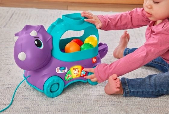 Fisher-Price Hrající Dino s vyskakujícími míčky CZ/SK/ENG/HU/PL HNR51